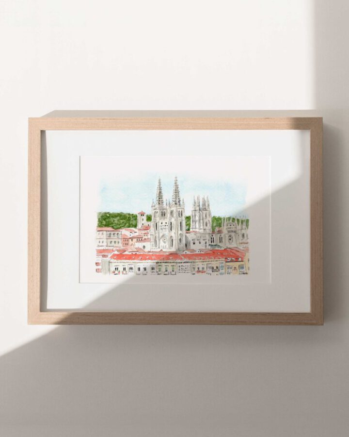 Lámina artesanal en acuarela de Burgos con la catedral gótica de agujas caladas, tejados rojizos del casco antiguo y arboleda