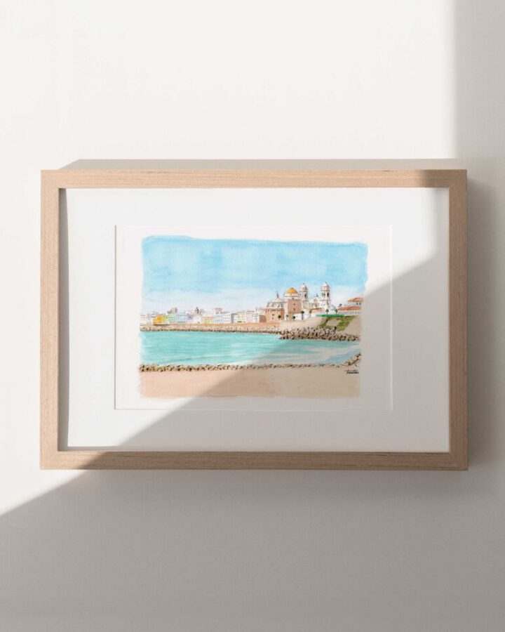 Lámina artesanal en acuarela de Cádiz con vista de la catedral, las fachadas del casco antiguo, la playa y las aguas turquesa